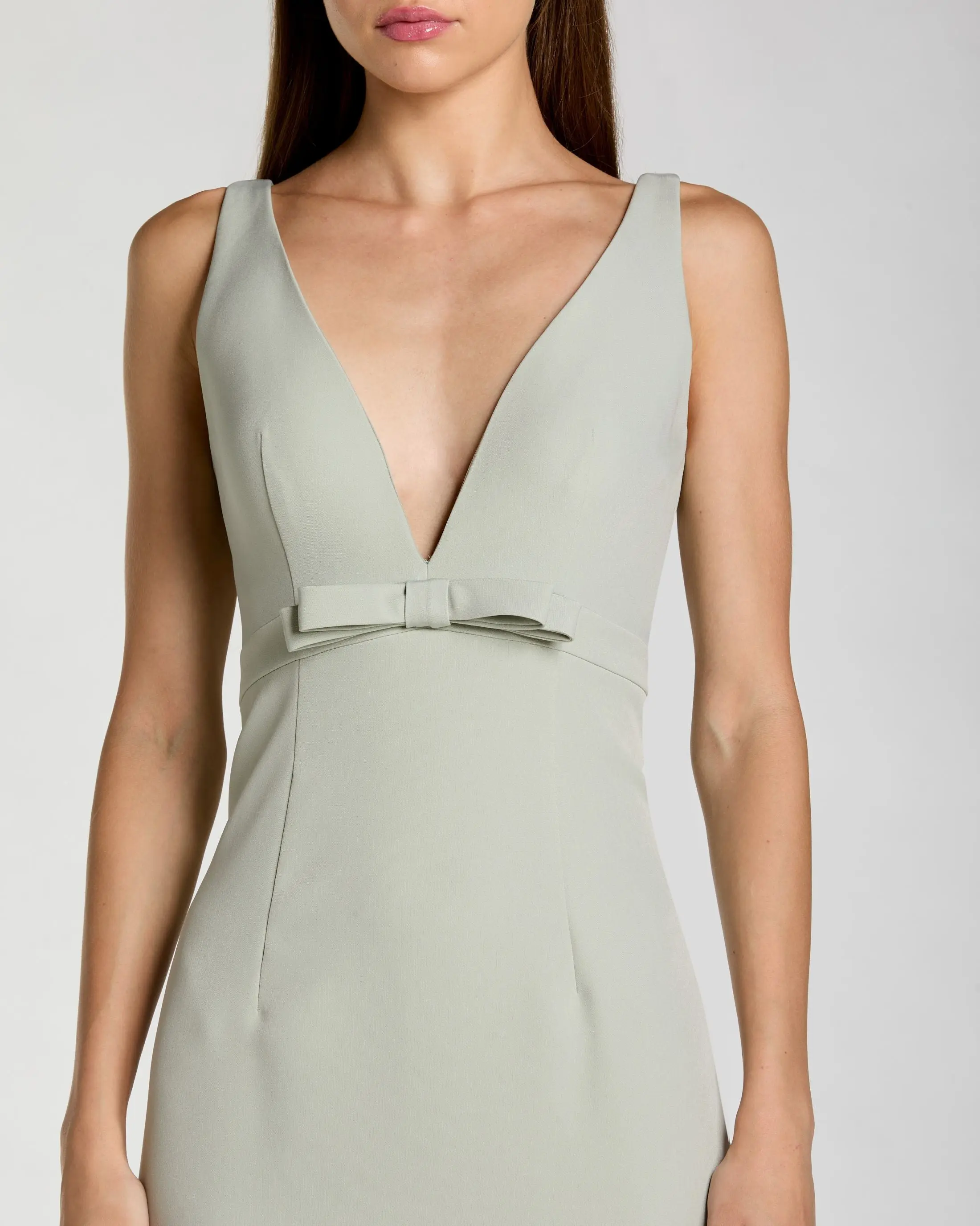 Light Green Crepe V-Neck Mermaid Gown with Bow - Special Events Unlimited