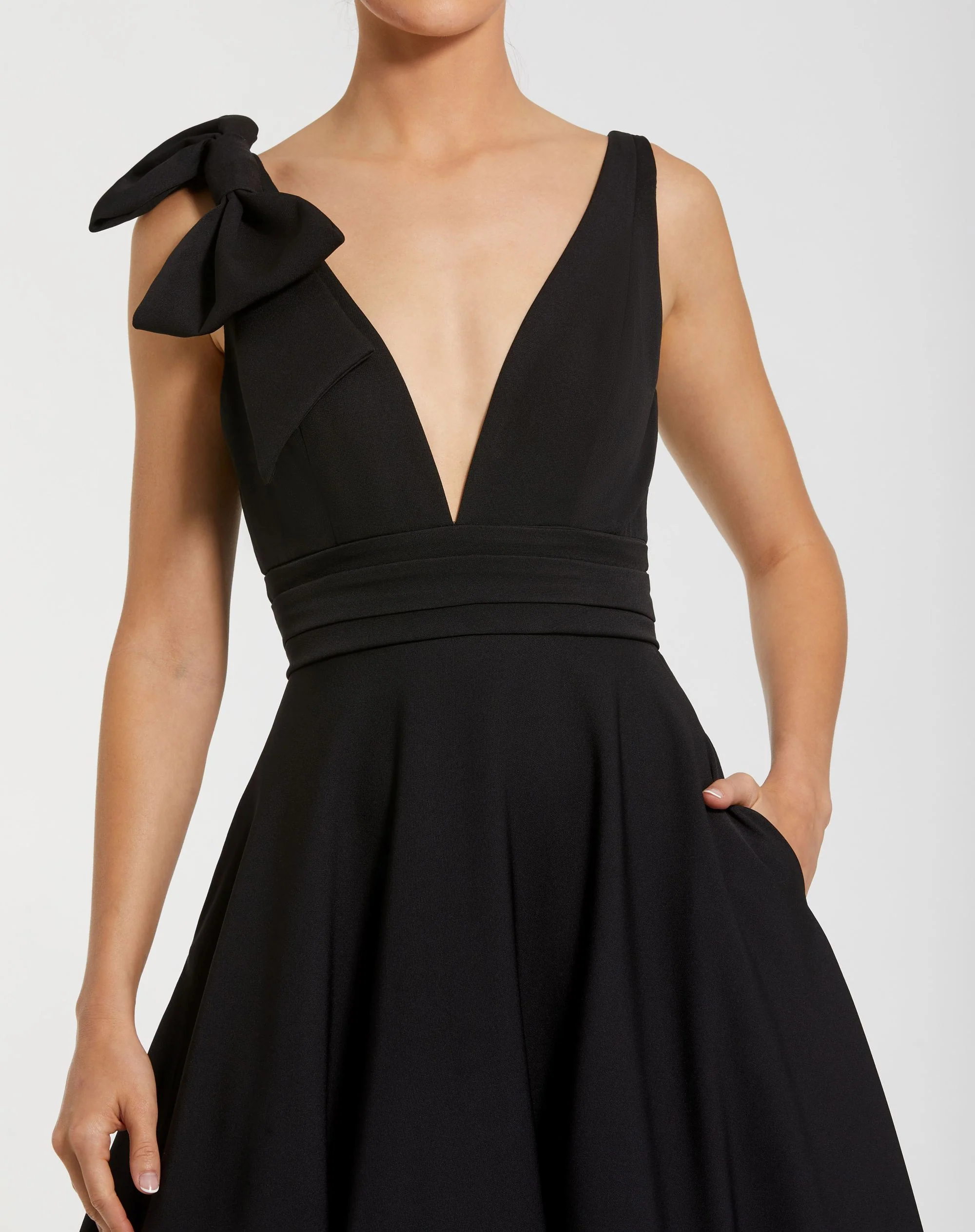 Petite Black Sleeveless Plunge Neck Ball Gown With Bow Detail - Special Events Unlimited