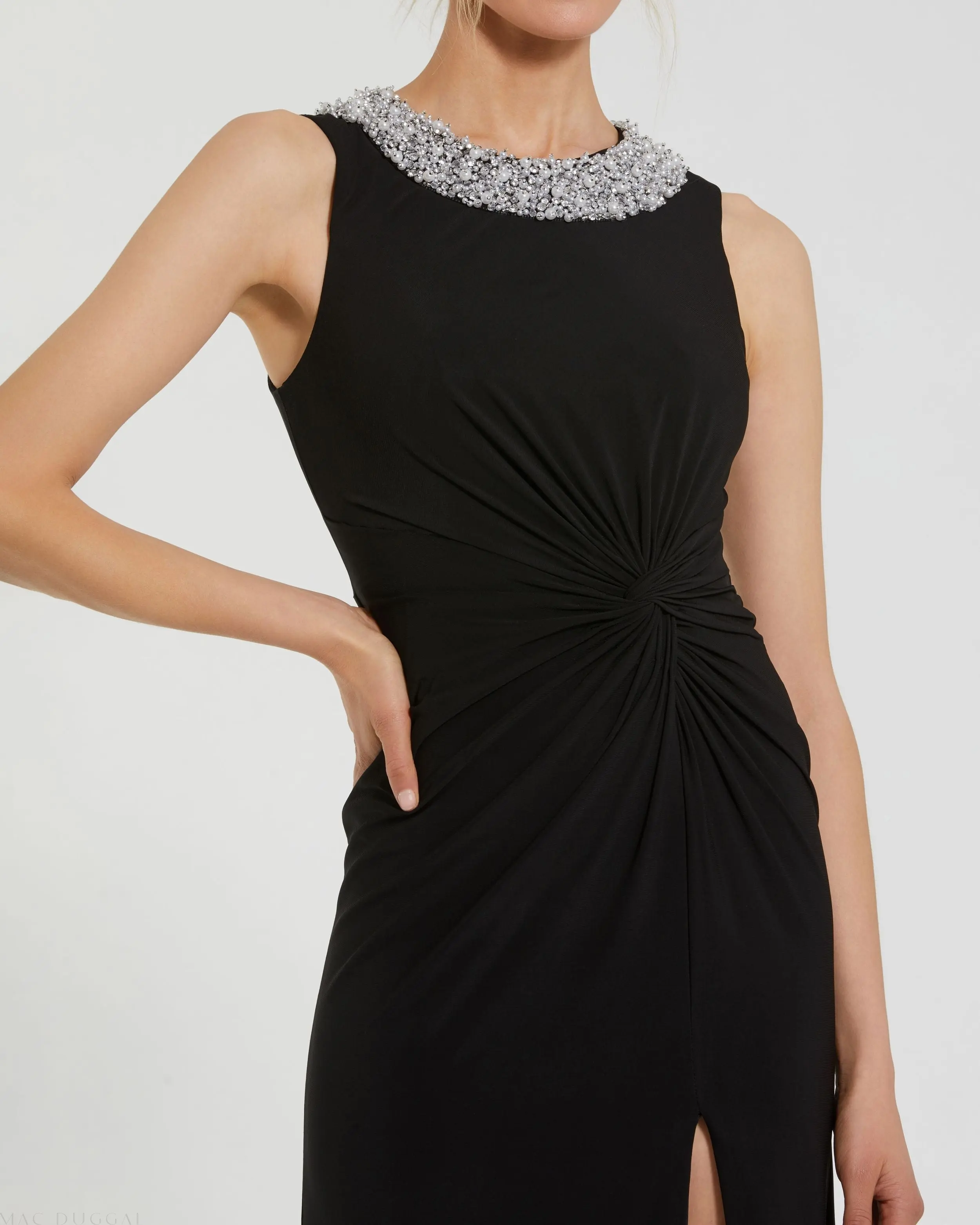 Black Jersey Sleeveless Beaded Neck Gown With Twist - Special Events Unlimited