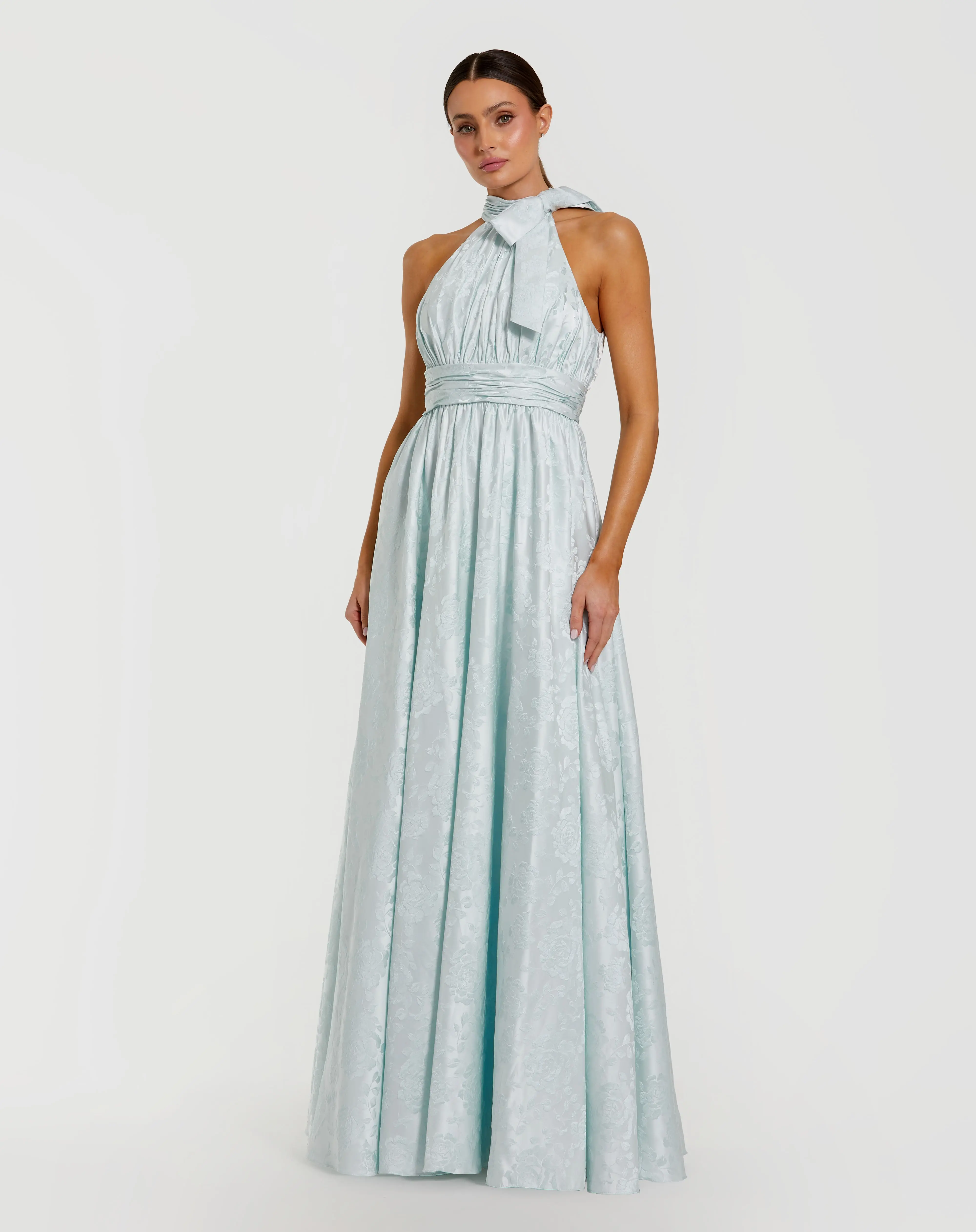 Blue Sleeveless Halter Neck Brocade Gown With Bow Detail - Special Events Unlimited
