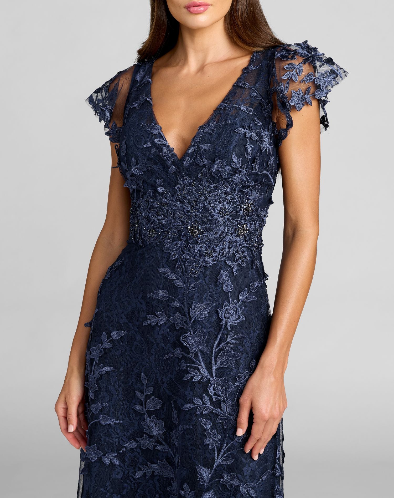 Navy Embroidered Applique Wrap Over Flutter Sleeve Gown - Special Events Unlimited