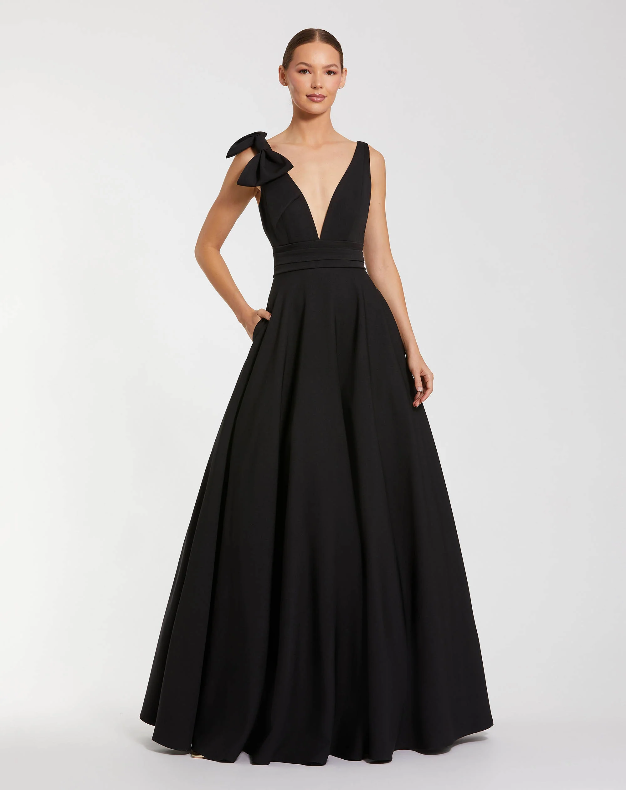 Petite Black Sleeveless Plunge Neck Ball Gown With Bow Detail - Special Events Unlimited