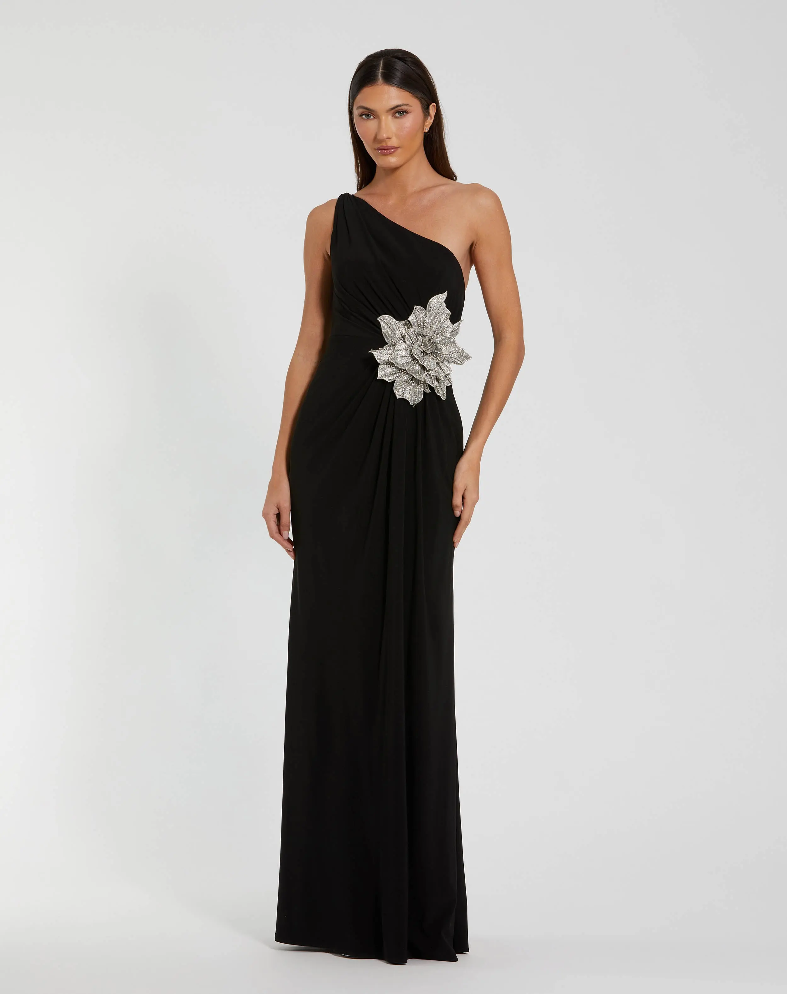 Black One Shoulder Jersey Gown With Rhinestone Flower - Special Events Unlimited