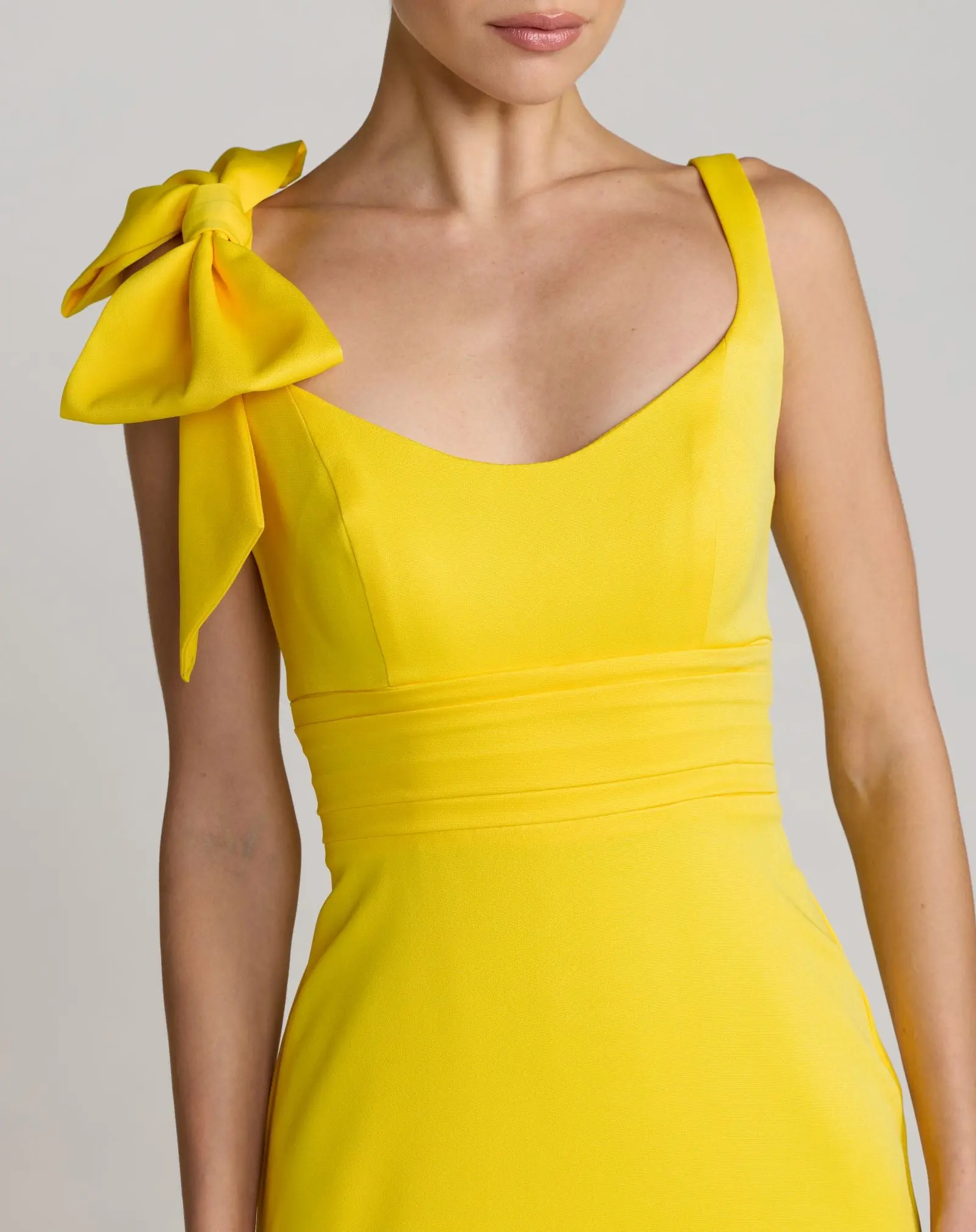 Yellow Scoop Neck Trumpet Gown With Bow - Special Events Unlimited