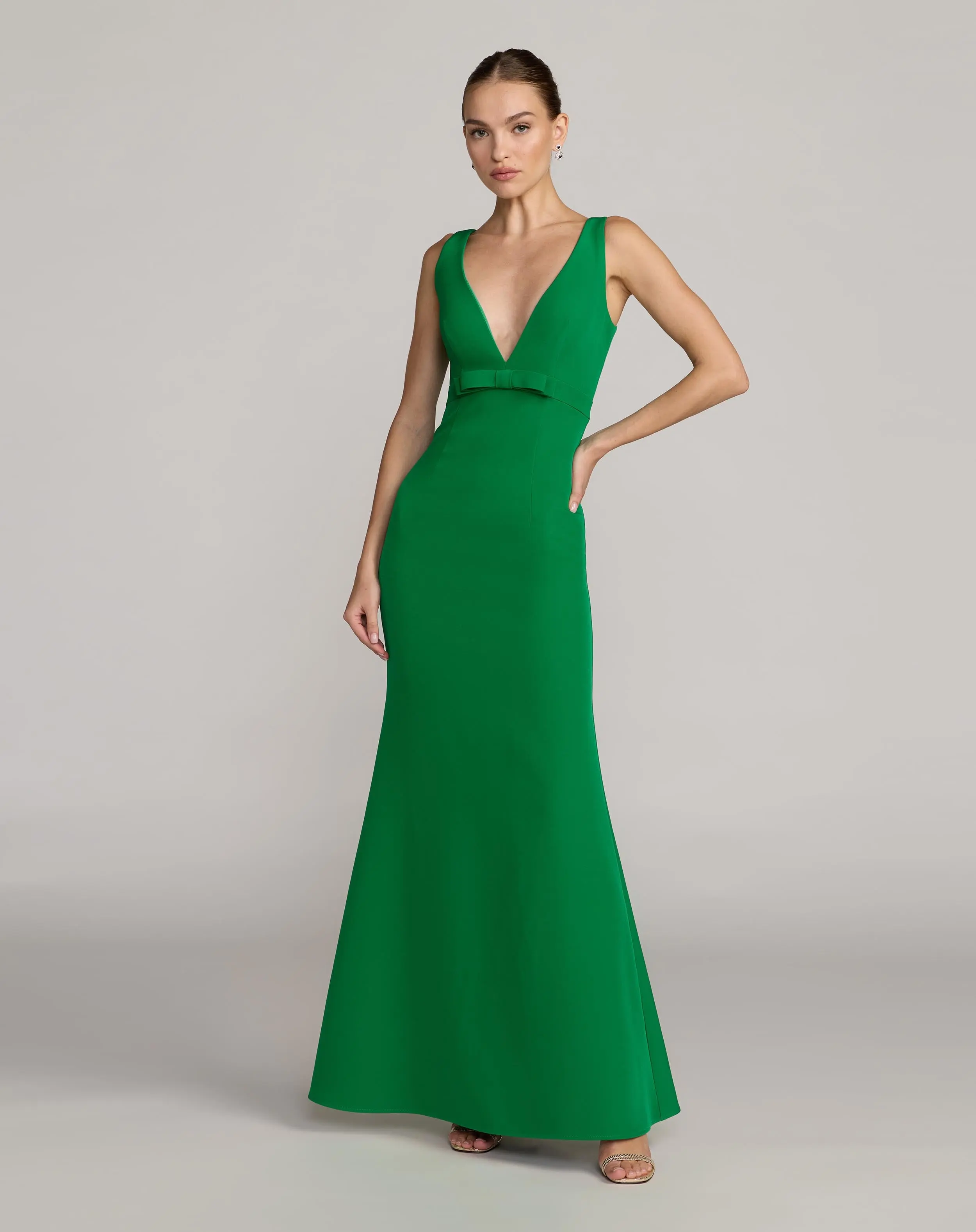 Green Sleeveless V Neck Mermaid Gown With Bow - Special Events Unlimited