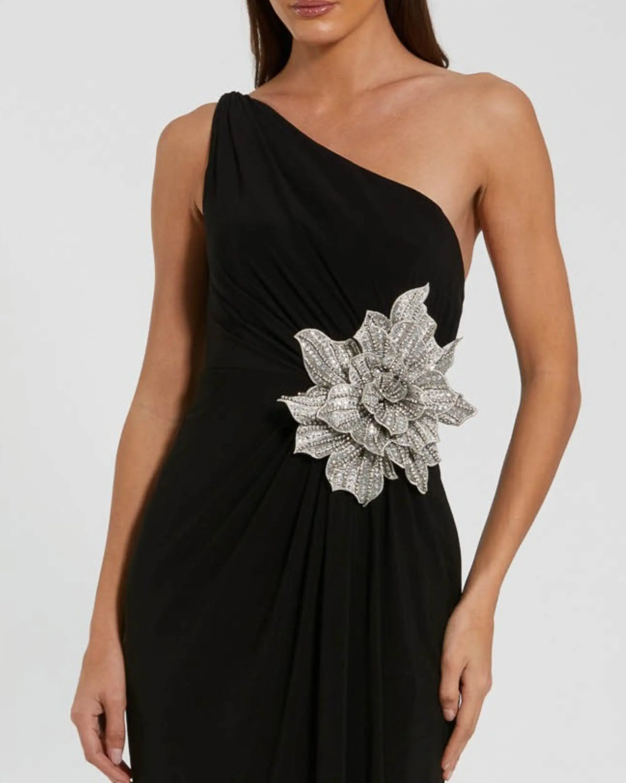 Black One Shoulder Jersey Gown With Rhinestone Flower - Special Events Unlimited