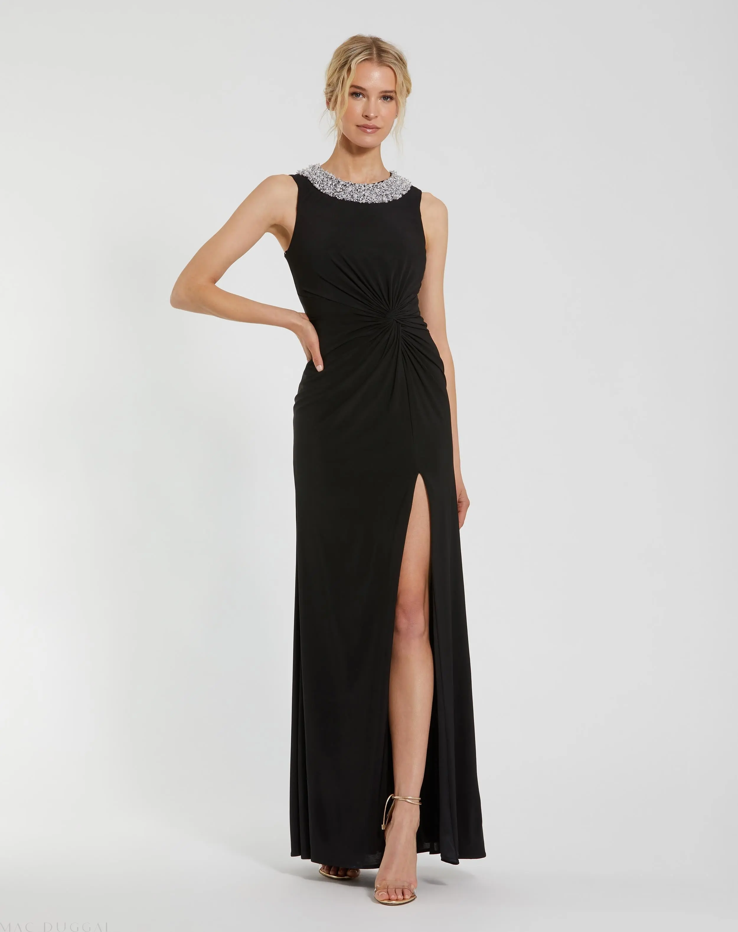 Black Jersey Sleeveless Beaded Neck Gown With Twist - Special Events Unlimited